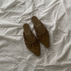 Barley used khaki green coloured flats from Zara.